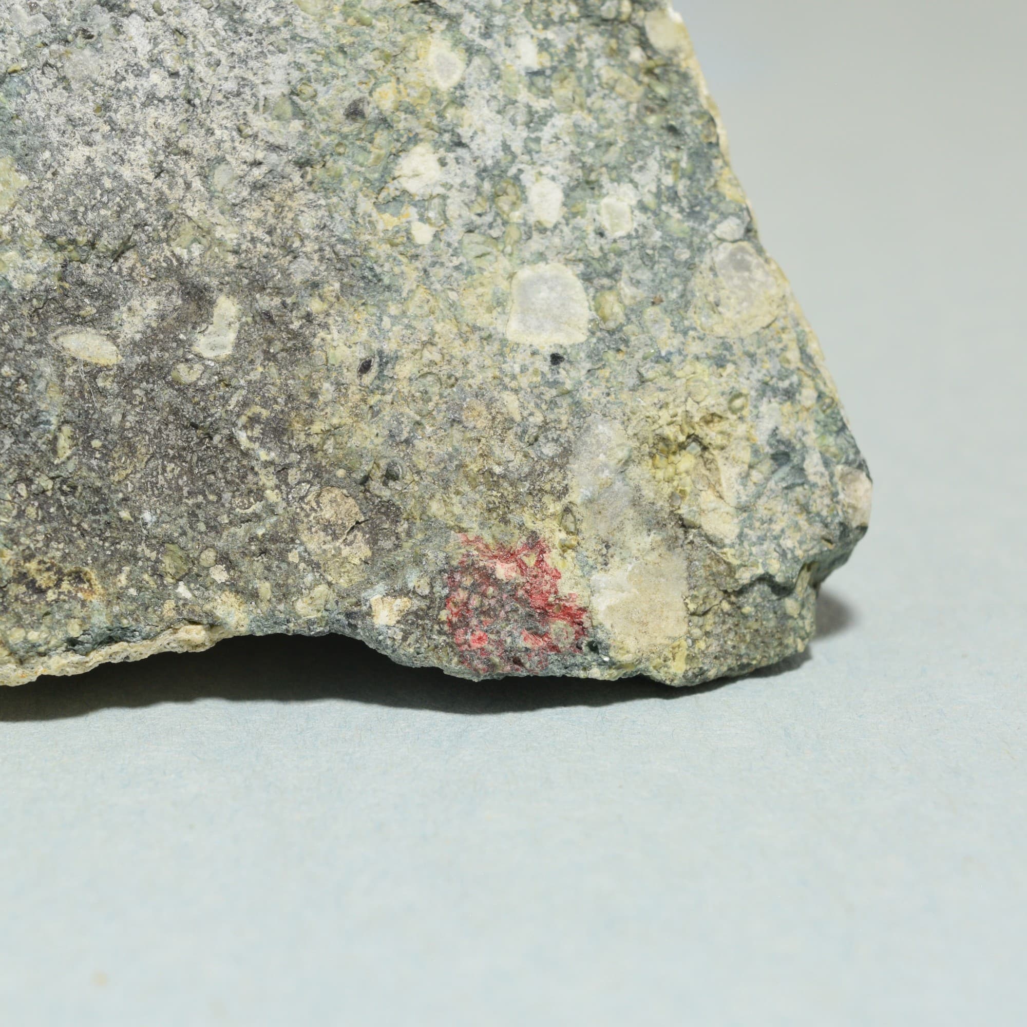 Close-up of red pyrope garnet in Sloan kimberlite matrix